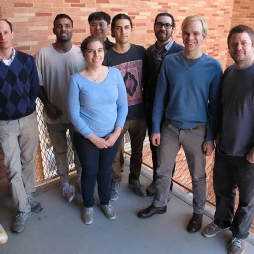 Lab members in 2016 standing outside building