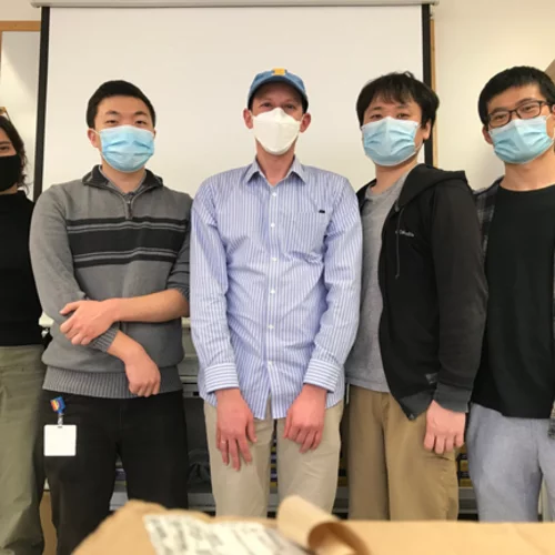 Masked lab members in 2020